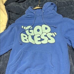 Vibrant Blue Hoodie with 'God Bless' Design